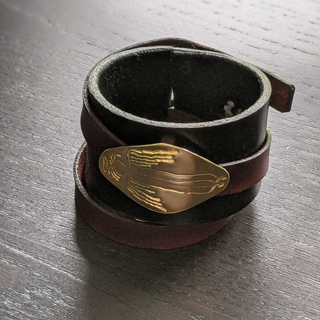 LEATHER BRACELET WITH REMOVABLE ANGEL AMULET - BROWN/TAN | < Z-FIRE.COM > Leather Bracelet  Removable .999 Fine Silver Silver Amulet 24K Gold Plated  1.5" Black Leather band with a 0.6"  Mahogany wrap-around leather strap 