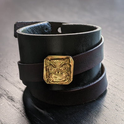 LEATHER BRACELET WITH GOLDEN DRAGON AMULET | < Z-FIRE.COM > .999 Fine Silver Amulet Removable 24K Gold Plated 1.5" Black leather bracelet, with a 0.6" mahogany wrap-around leather strap About 1.5 Inches Total Length About 14 cm Total Length﻿ Free Astrology Report of Choice Free Standard Shipping Hassle Free Returns