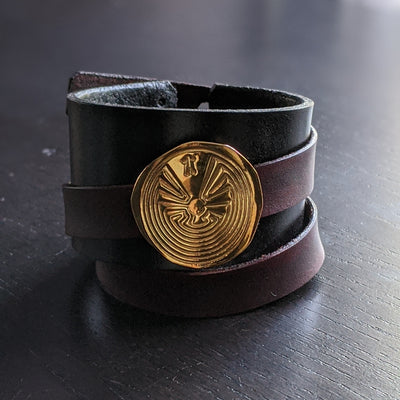 LEATHER BRACELET WITH GOLDEN MAZE AMULET | < Z-FIRE.COM > .999 Fine Silver Amulet/ Removable 24K Gold Plated 1.5" Black leather bracelet, with a 0.6" mahogany wrap-around leather strap, Leather rivets and button clasps are of base metals