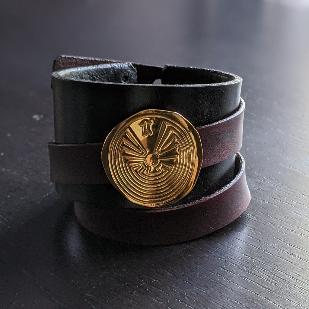 LEATHER BRACELET WITH GOLDEN MAZE AMULET | < Z-FIRE.COM > .999 Fine Silver Amulet/ Removable 24K Gold Plated 1.5" Black leather bracelet, with a 0.6" mahogany wrap-around leather strap, Leather rivets and button clasps are of base metals