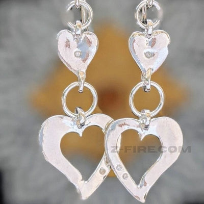 DOUBLE HEART CHAKRA FINE SILVER DANGLE EARRINGS | <Z-FIRE.COM> Stay in your true alignment with the help of   Free Standard Shipping Free Astrological Report of Choice Hassle Free Returns .999 Fine Silver Hearts .925 Sterling Silver Kidney Wires 0.5 Inches wide 1.5 cm wide About 1 Inch Total Length 3 cm Total Length Hassle Free Returns