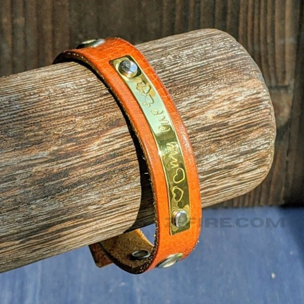 Paw-Print Text And Leather Bracelet Cuff BraceletPAW-PRINT TEXT AND LEATHER BRACELET | < Z-FIRE.COM > Brown Leather Bracelet  0.25 " Wide Brass Plate With Text  Brass Clasp Free Astrological Report Free Standard Shipping Hassle Free Return Ready To Ship