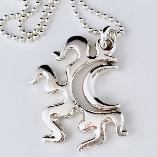 FINE SILVER SUN MOON SWIVEL PENDANT | < Z-FIRE.COM >  https://z-fire.com/products/sun-moon-pendent  A half Moon swiveling inside of a Half Sun. A therapeutic tool or pendant to swivel, while in contemplation or to calm your nerves. Free standard shipping Free Astrology Report of Choice .925 Silver Sun Moon With The About 1 Inch Long 2.5 cm Long About .75 Inch Wide 2cm Wide 1/8 Inch Thick About 3mm Thick With Or Witho…